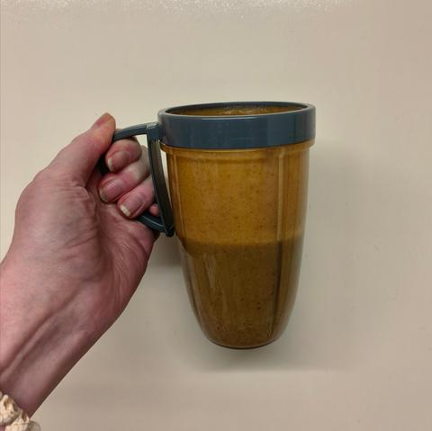 Delicious date smoothie in NutriBullet cup.