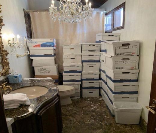 Dozens of boxes of classified docs stored in his unlocked bathroom.