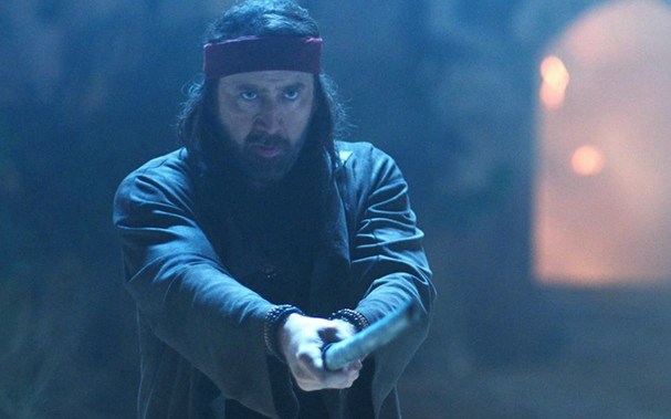Nicolas Cage wielding a sword from the 2020 film Jiu Jitsu.