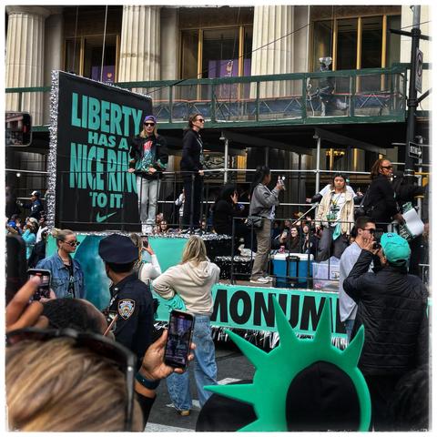 Courtney Vandersloot (in shades and a backwards purple cap) on her float at the New York Liberty Championship Parade 🗽