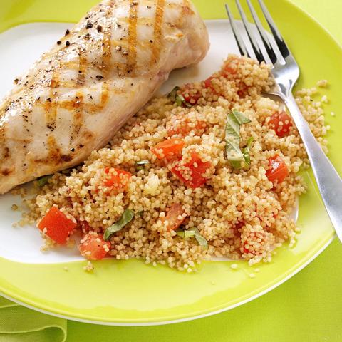 Not my creation, but an attractive dish of grilled chicken breast served with couscous and vegetables.