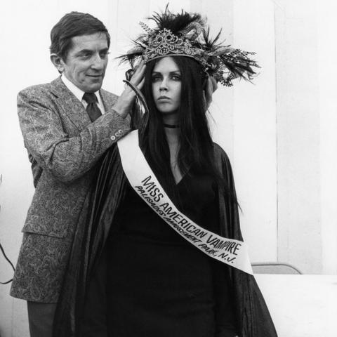 Actor Jonathan Frid crowns Christine Domaniecki at the New Jersey regional competition for Miss American Vampire (1970).
