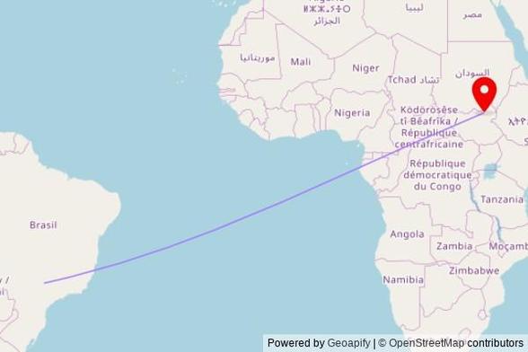 A map showing the great circle route from Catanduva in Brazil to a map pin at Saint Charles Lwanga Church, Nyikango Road, Malakal, South Sudan