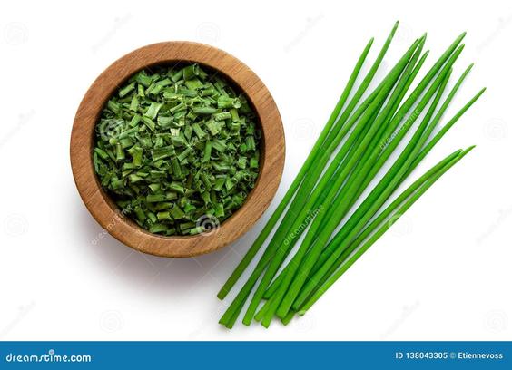An image of fresh chives ... a fairly large wooden bowl contains some of it that had been finely chopped. Fresh chives added to a baked potato with sour cream may be a great side dish, a light meal or even a snack.