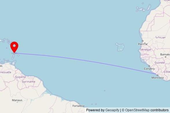 A map showing the great circle route from Commonwealth-C in Liberia to a map pin at Minor Basilica of the Immaculate Conception, Micoud Street, Castries, Saint Lucia