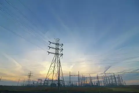 Sunrise photo of power transmission lines
