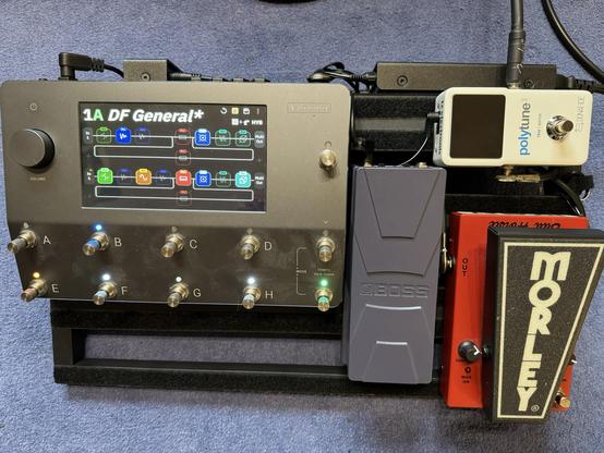 Pedalboard with quad cortex, BOSS expression pedal, Morley Bad Horsey away 2, and a Polytune tuner. 