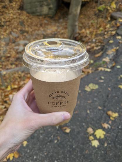 Photo of me holding the maple cinnamon cold latte during the start of our walk. (One of my favorites.)