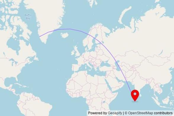 A map showing the great circle route from Nuuk in Greenland to a map pin at Masjidhul Furugaan, Husnuheenaa magu, Fuvahmulah 18016, Maldives