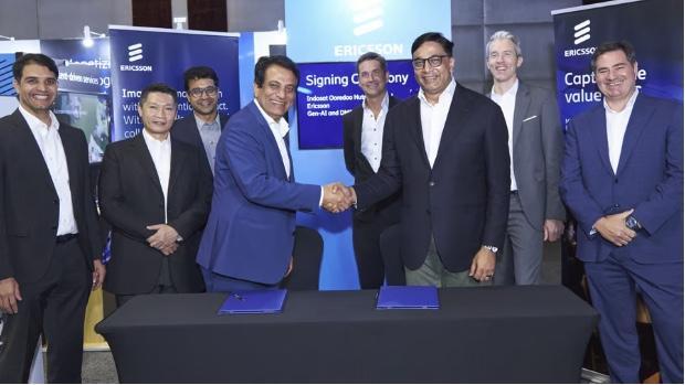 Executives from Ericsson and Indosat Ooredoo Hutchison commemorate a strategic partnership in this signing ceremony, highlighting their shared commitment to advancing digital connectivity in Indonesia. Two leaders, at the center, shake hands over signing documents, surrounded by colleagues celebrating this milestone. With Ericsson banners in the background, the image captures a pivotal moment in telecom, promising to enhance 5G services and digital innovation for millions of users @HaroldSinnott