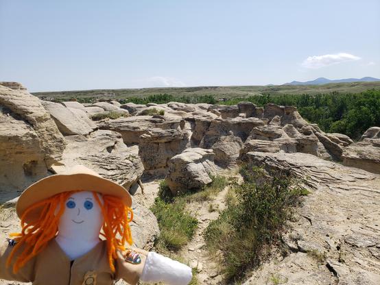 Ranger Sarah with a view of the maze of hoodoos
— at Writing-On-Stone Provincial Park/ Áísínai'pi.
