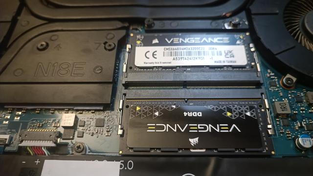 close up of my laptop's motherboard, the new memory kit is installed in their slots, doubling the previous memory cap