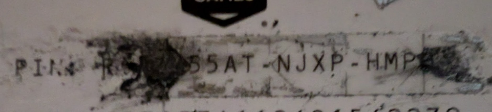 Gift card PIN partially revealed because the scratch-off material is poor quality and can't be entirely removed. 