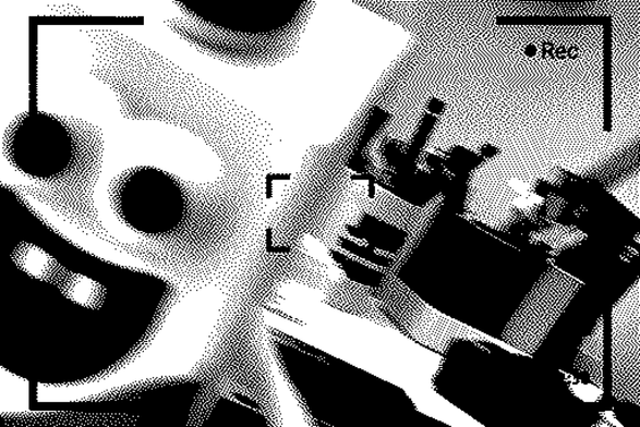 A heavily dithered black & white image of a blurry security camera frame, showing a manic faced milk-carton shaped figurine with some desk knick-knacks in the background. 