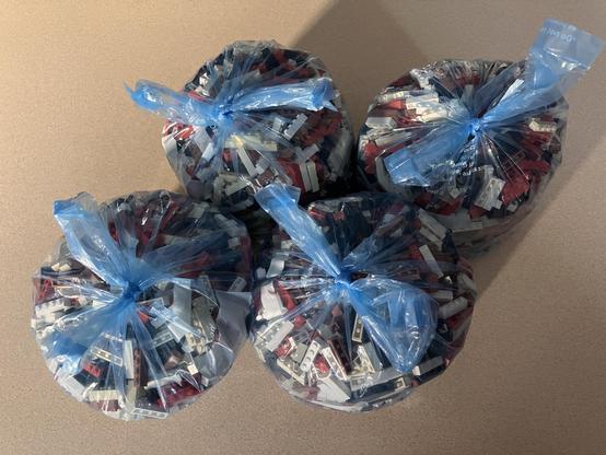 2Kg of Modulex parts mixed up in 4 equal-sized plastic bags