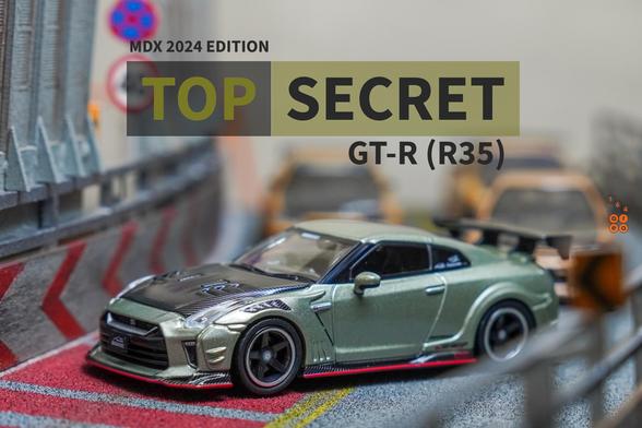A left side of Nissan Skyline GT-R (R35) Top Secret, Malaysia Diecast Expo 2024 Edition by iNNO64 in 1:64 scale on AREA 164