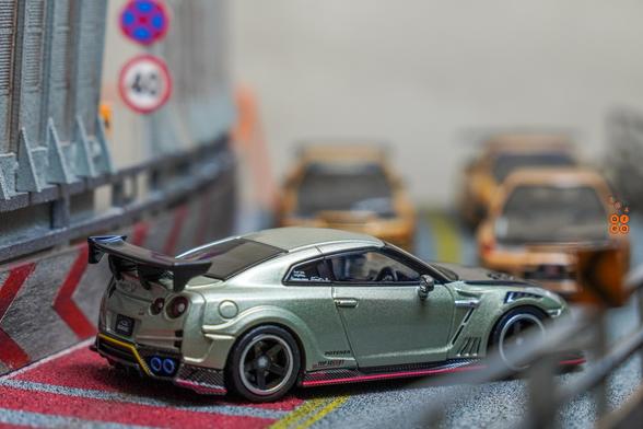A right side of Nissan Skyline GT-R (R35) Top Secret, Malaysia Diecast Expo 2024 Edition by iNNO64 in 1:64 scale on AREA 164