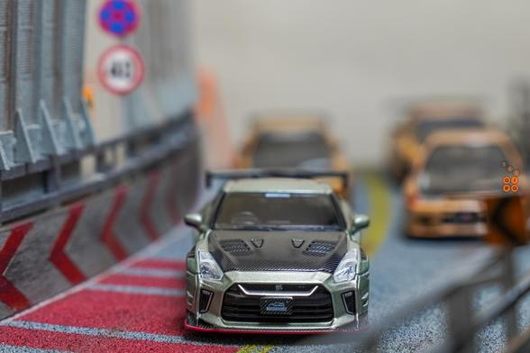 A front side of Nissan Skyline GT-R (R35) Top Secret, Malaysia Diecast Expo 2024 Edition by iNNO64 in 1:64 scale on AREA 164