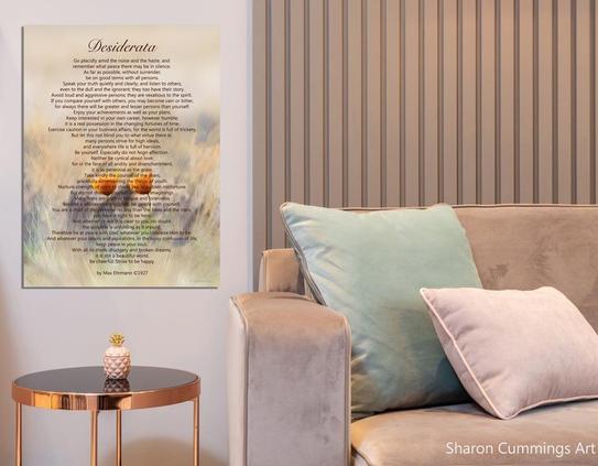 Decor scene in neutral earth tones with art containing 2 orange poppies overlaid with the Desiderata poem by Sharon Cummings.
