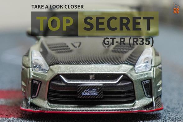 A close-up shot of Nissan Skyline GT-R (R35) Top Secret, Malaysia Diecast Expo 2024 Edition by iNNO64 in 1:64 scale on AREA 164