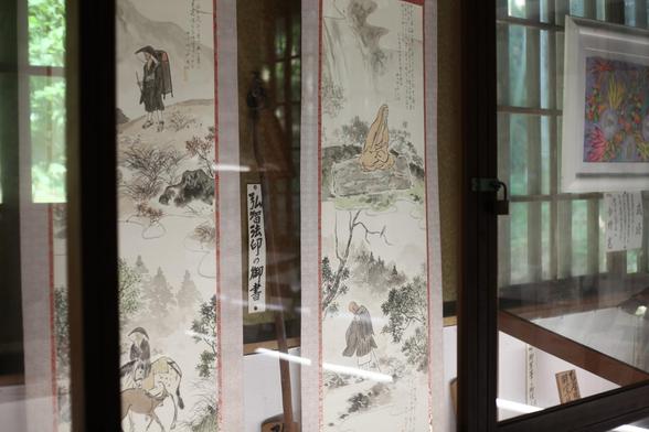 Scrolls hanging at Saisho-ji, telling the story of Kochi Hoin (who would become a mummy).