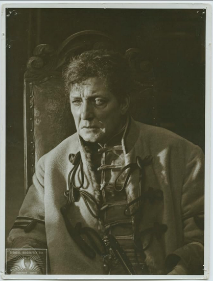 an image of a man in an old-fashioned lace-up front shirt, a worried look on his face, he is looking to the left