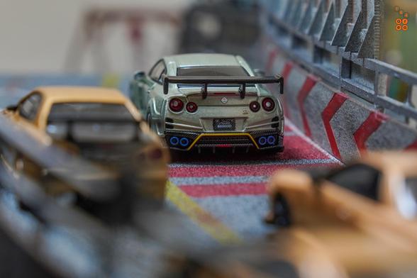 A rear sight shot of Nissan Skyline GT-R (R35) Top Secret, Malaysia Diecast Expo 2024 Edition by iNNO64 in 1:64 scale on AREA 164