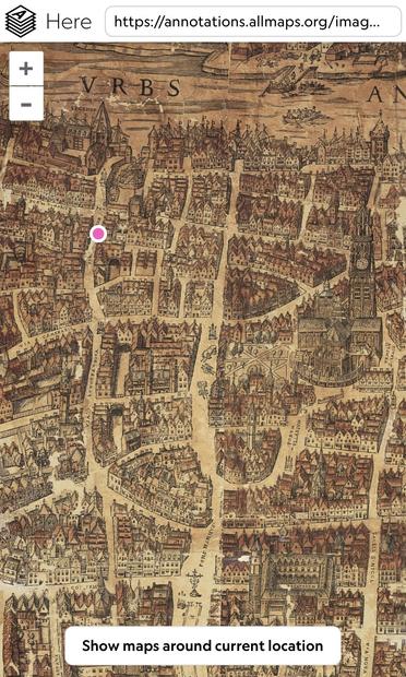 A vintage map showing a detailed, hand-drawn layout of a historic city with tightly packed buildings, narrow streets, and several landmarks. There is a purple marker near the center of the map. A button at the bottom reads, "Show maps around current location."