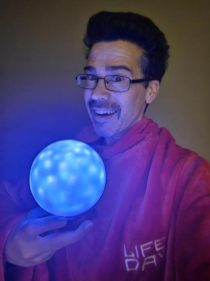 You're wearing a shirt and holding a phone. I'm wearing a red robe and holding an orb from Kashyyyk on Life Day. We are not the same.