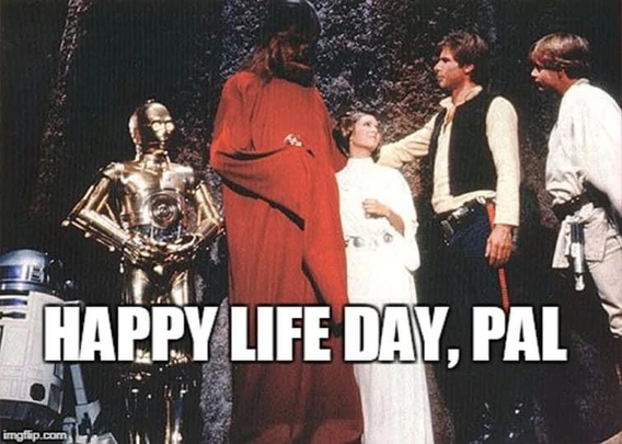 R2-D2, C-3PO, Chewbacca in a red robe, Princess Leia, Han Solo, and Luke Skywalker at the finale scene of the Star Wars Holiday Special (television special which aired on this day in 1978). Caption: “HAPPY LIFE DAY, PAL” (spoken by Harrison Ford as Han Solo).