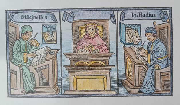 Photo of finished product. Three seated figures, two writing, one reading. In green, red and blue robes. Brown and orangegold furniture. Paleblue walls. Darkblue banners.
Medieval style. 
