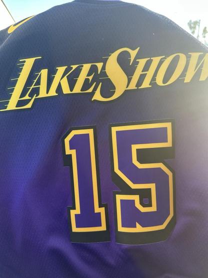 A Lakers LakeShow 2024-2025 City Edition in Purple with Gold letters and purple number 15 with gold outline front jersey 