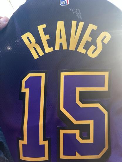 A Lakers LakeShow 2024-2025 City Edition in Purple with Gold letters and purple number 15 with gold outline back of jersey 

With Reaves in Gold letters in back. 