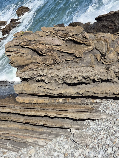 Twisted flysch layers, rotated to horizontal