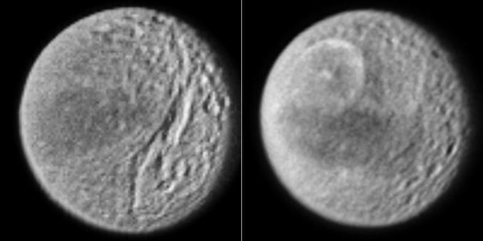 Two images of Saturn's moon Tethys taken by the Voyager missions. A dark streak runs along the equator, its origin still disputed.  North of it in the image at right is a circle, a large impact basin called Odysseus. There is a hint of a second large impact basin in the other image, at lower right and southeast of a big valley called Ithaca Chasma.
