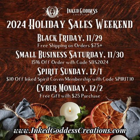 A schedule of our big holiday sales is listed in white text against a dark wood background with dried orange slices, white votive candles, a sprig of ivy, and grey cloth sachets. Presented by Inked Goddess Creations.