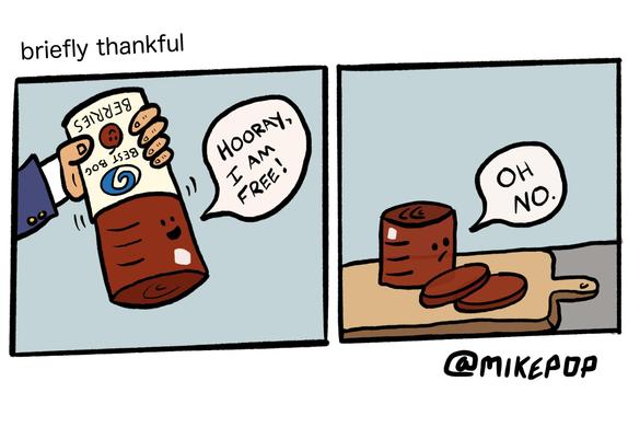 A 2-panel comic. In the first panel, a hand is shaking a can of jellied cranberry sauce. The cranberry blob is shouting “Hooray, I am free!” In the second panel, the cranberry blob sits on a cutting board with several slices of itself on the side. A speech bubble says “Oh No”.