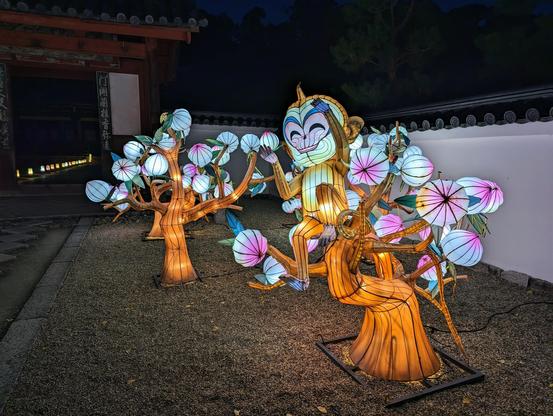 Lantern monkeys frolic amongst peach trees at Manpuku-ji's light up festival.