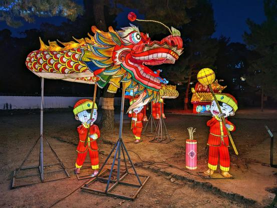 A dragon dance in lanterns.