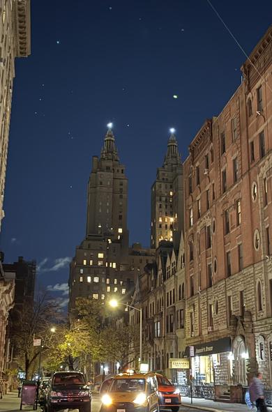 A night mode image of the San Remo and the winter constellations looking down upon Manhattan’s Upper West Side. 