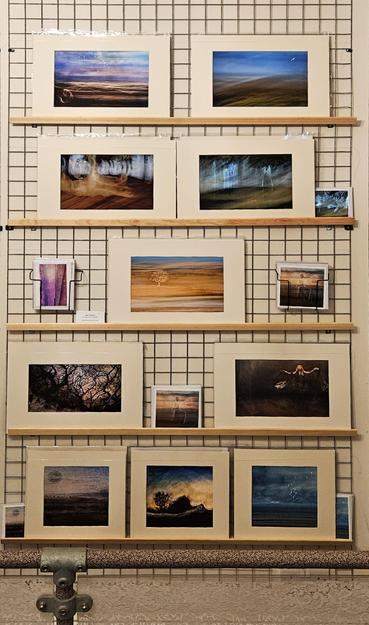 A display of impressionistic pictures, with themes of mystic places.
