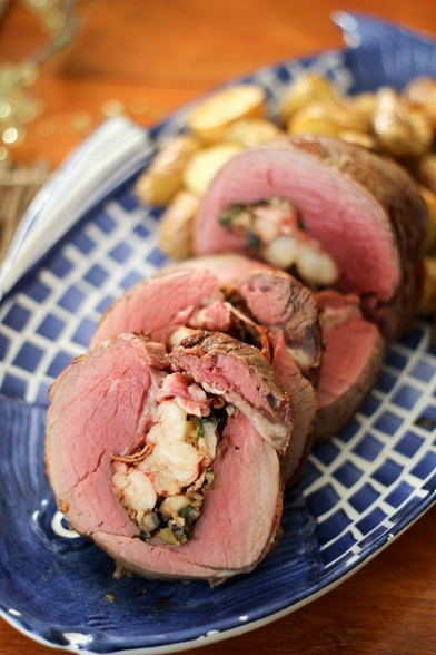 Platter of sliced, lobster stuffed chateaubriand 