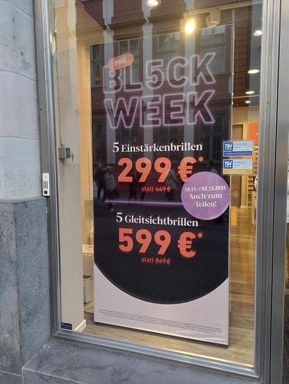 Schaufensterwerbung: "Black Week, 5 Einstärkenbrillen 299€, 5 Gleitsichtbrillen 599 €"