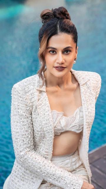 Taapsee Pannu’s latest photoshoot is the epitome of summer chic. Posing poolside in a white cutout co-ord set, she balances boldness and elegance, proving why she’s a fashion icon to watch. Her effortless styling makes this look a standout.