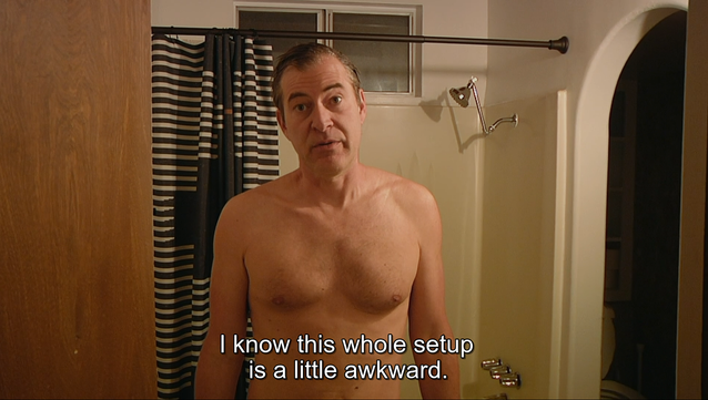 Screenshot from the horror series "The Creep Tapes," showing star Mark Duplass's hair as noticeably thinner and grayer than it was in the original movies, even though this TV show is supposedly set years before those.