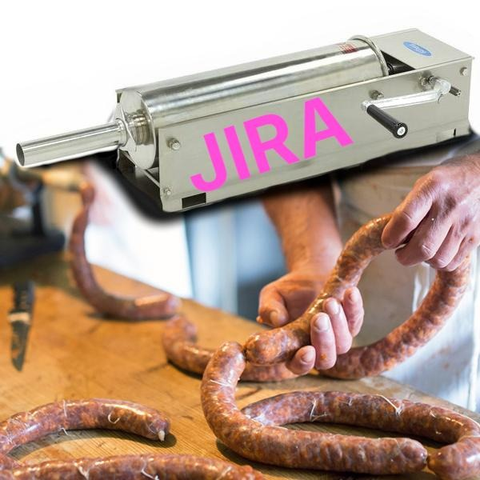 Sausage stuffing machine with JIRA written on it
