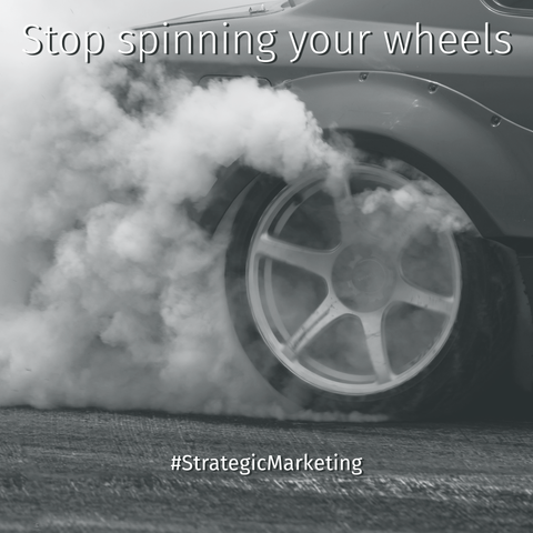 car wheel spinning, throwing off smoke