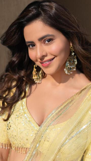 Aamna Sharif proves why yellow is the ultimate festive color with her gorgeous lehenga. Every detail, from the rich fabric to the delicate design, speaks of unparalleled craftsmanship. Get inspired by her stunning look for your next special event.