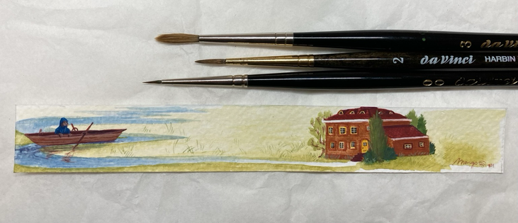 A scrap of aquarelle paper, size 2x15cm, with a gouache painting on it of an orange-brick red house with trees and bushes on the right. On the left, a river that is formed from the path leading from the house, there is a rowboat with a traveller in a blue raincoat sitting in it. 