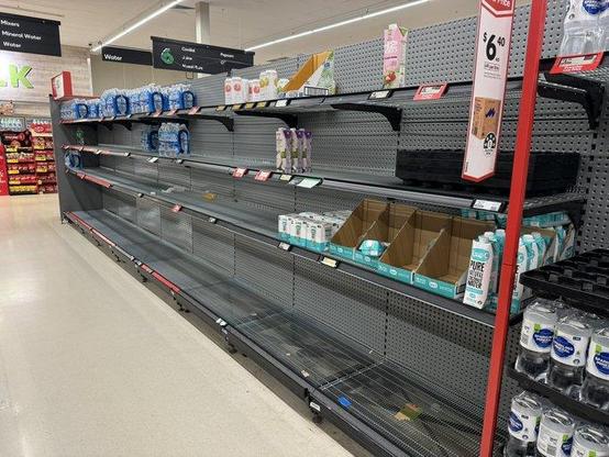 Empty supermarket shelves at Woolworths December 2024 
